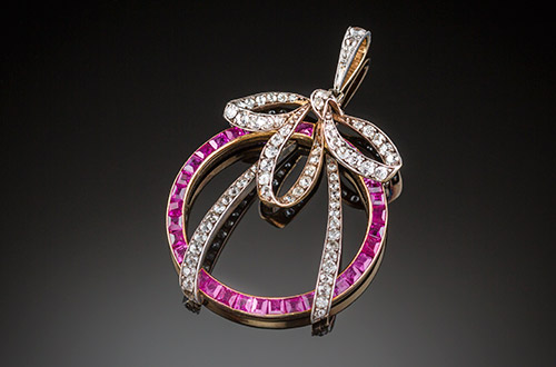 A Belle Epoque ruby and diamond pendant in silver and gold