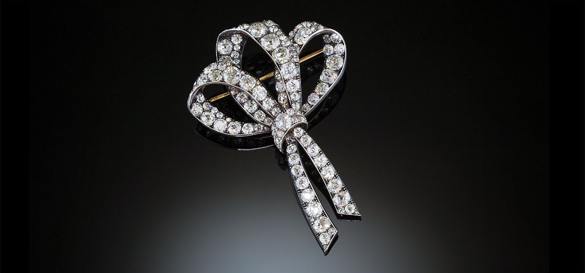 Large antique diamond triple loop ribbon bow brooch