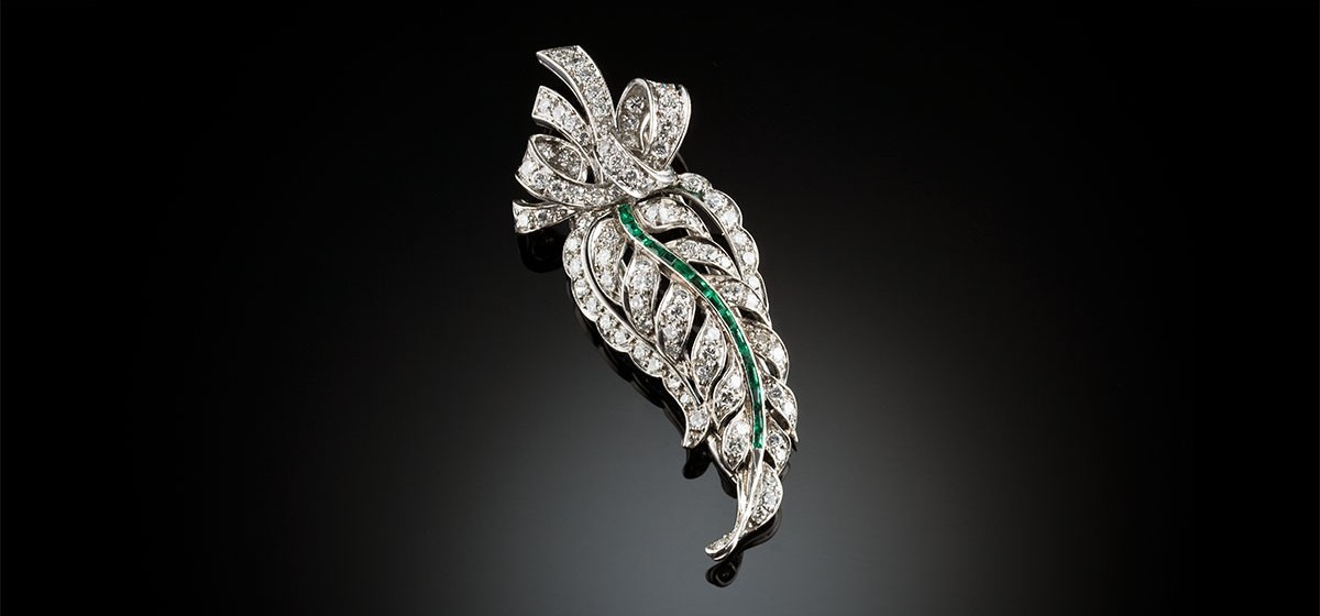 French diamond and emerald leaf and ribbons brooch circa 1945