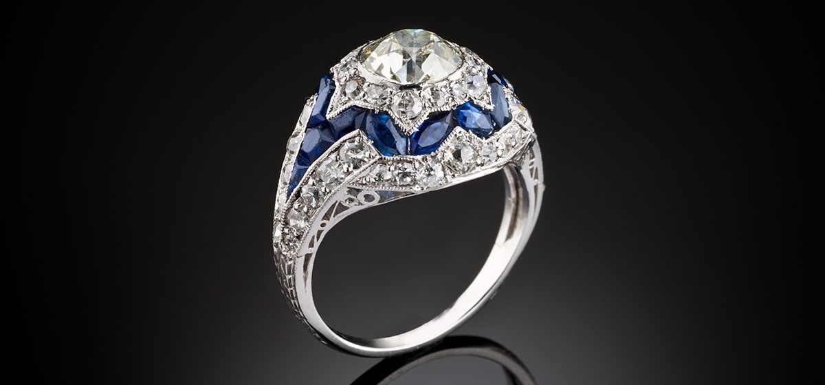 A diamond and sapphire early Art Deco bombe ring