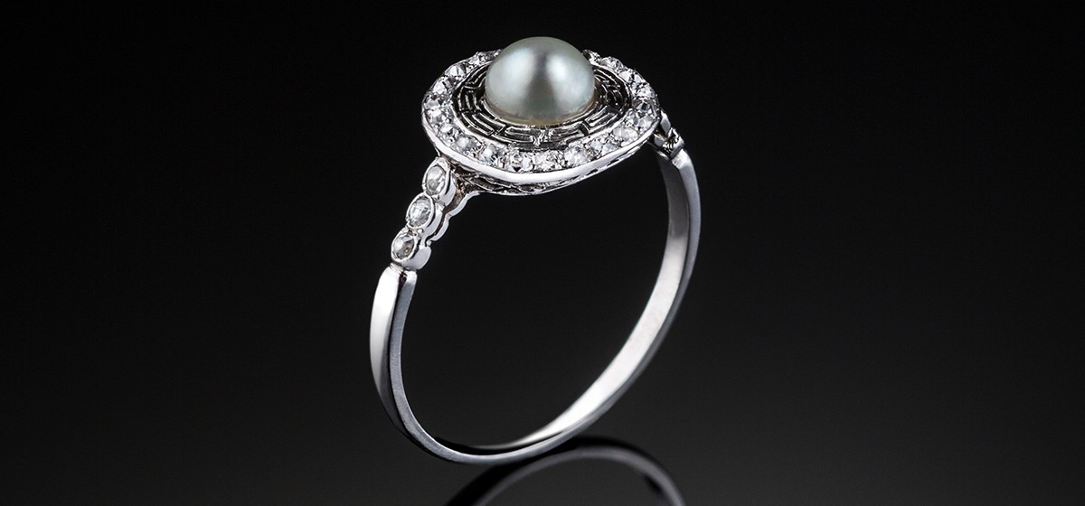  A Belle Epoque pearl and old cut diamond platinum set fine ring