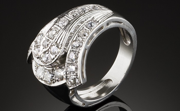 A late Art Deco diamond buckle ring