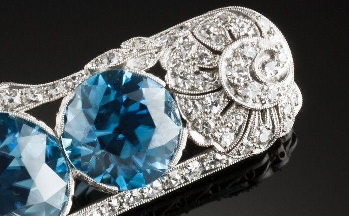 Art Deco blue zircon and diamond platinum brooch. Walton & Co