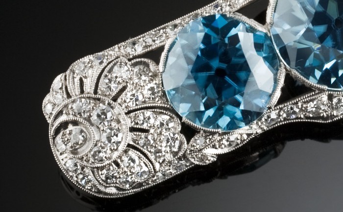 Art Deco blue zircon and diamond platinum brooch. Walton & Co