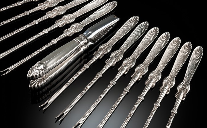 An Antique cased American sterling silver lobster fork set by Frank w. Smith Silver & Co