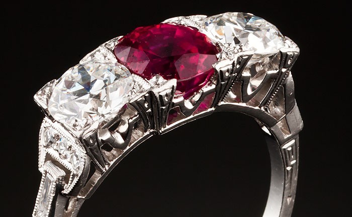 An Art Deco ruby and diamond three stone ring