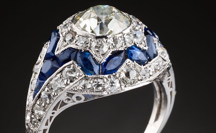 A diamond and sapphire early Art Deco bombe ring