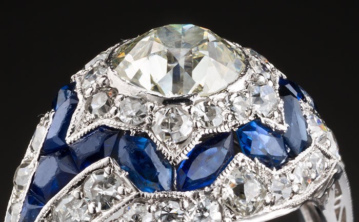 A diamond and sapphire early Art Deco bombe ring