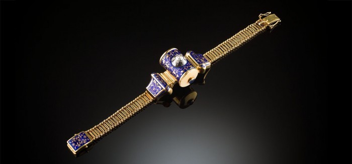An antique gold and rich blue enamel bracelet