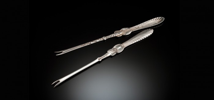 An Antique cased American sterling silver lobster fork set by Frank w. Smith & Co