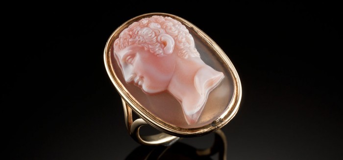 A large antique cameo ring in a yellow gold setting
