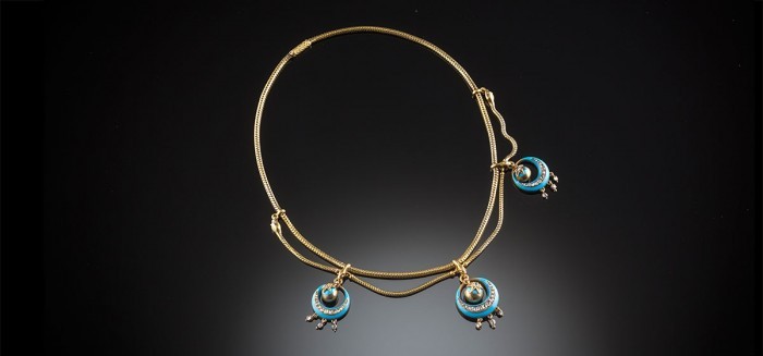 An antique gold enamel and diamond love token necklace