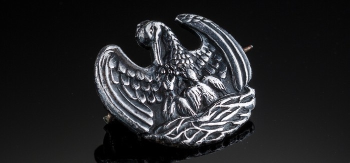 A tiny Vintage sterling silver bird and chicks pin