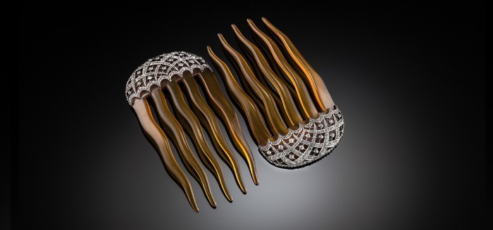 Antique hair combs of paste, silver and faux amber celluloid