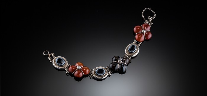 Antique silver bracelet set with various agates