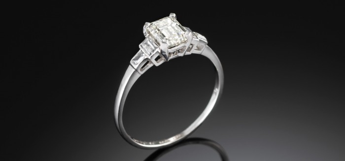 Art deco platinum and emerald cut diamond ring by historic mappin and webb